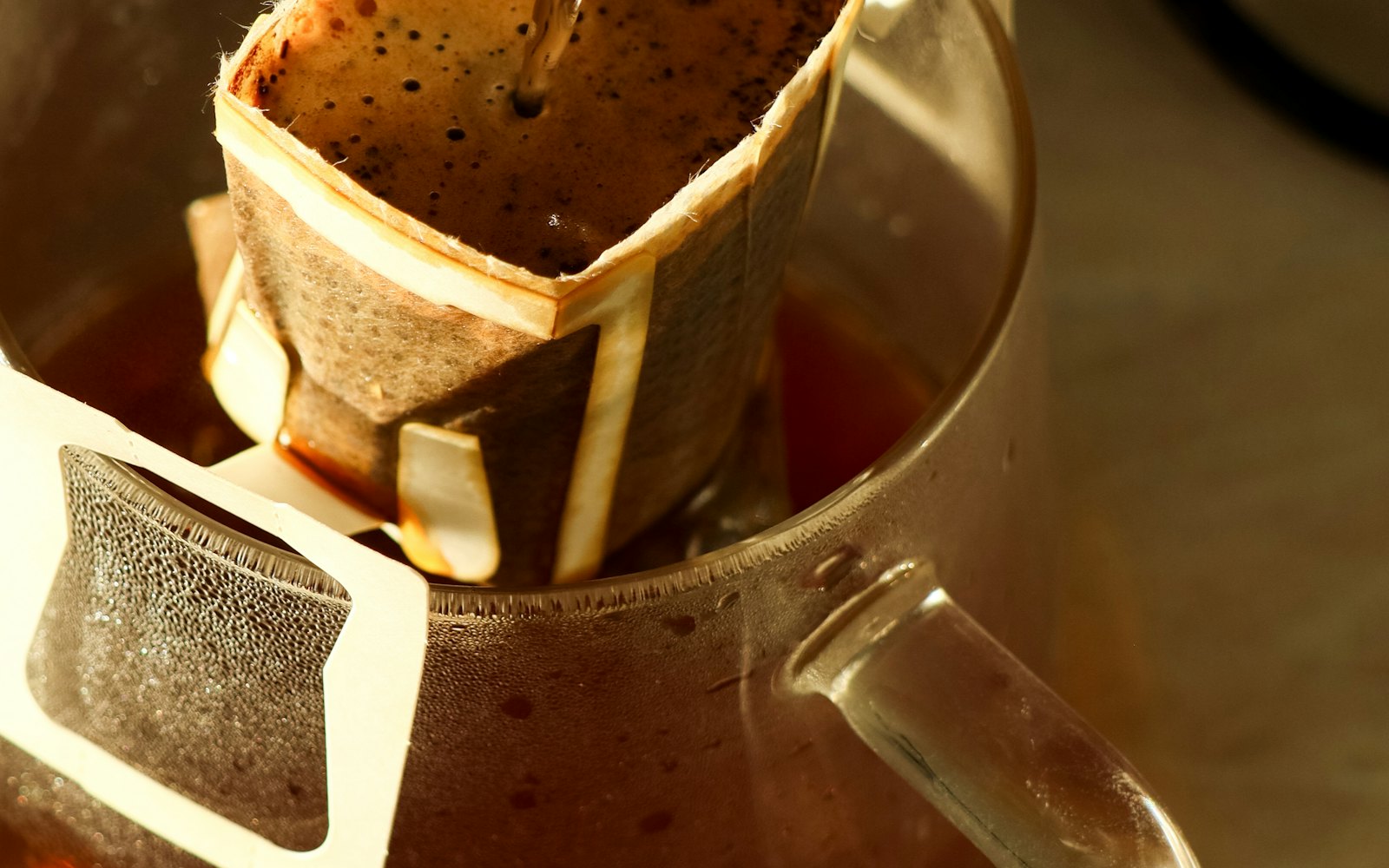 Hot water pouring into a pour over coffee filter